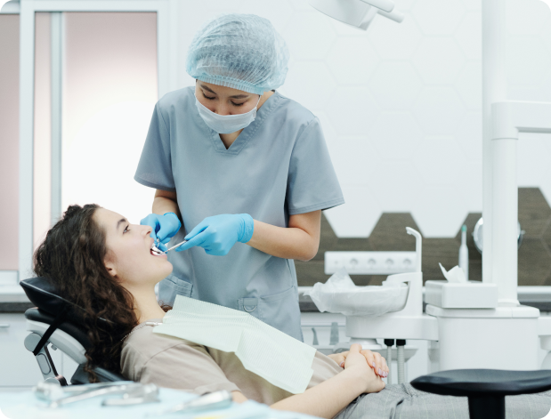 Dentist treating a patient in a modern clinic